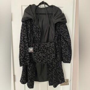 Mycra Pac Lightweight reversible rain coat